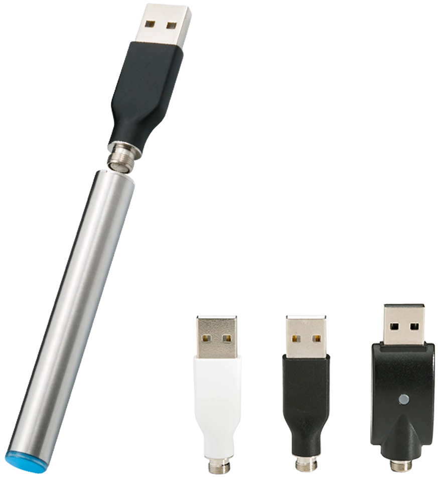 An assortment of CCELL USB chargers in white and black colors.